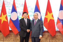 Thủ tướng Nguyễn Xuân Phúc đón Thủ tướng Lào sang thăm Việt Nam